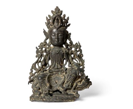  CHINESE BRONZE FIGURE OF MANJUSHRI SEATED ON A LION MING DYNASTY, 17TH CENTURY 明 銅鑄文殊菩薩騎獅座像the bodhisattva cast seated in la