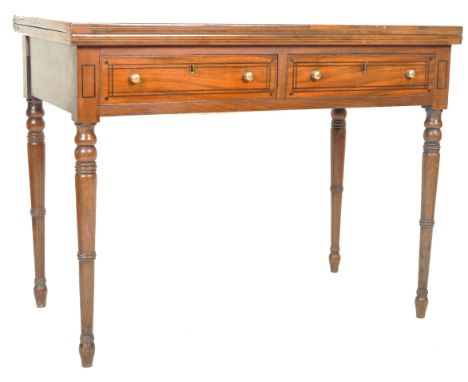 A 19th Century mahogany card / games table of large size having a fold over top with green baize lined playing area and foldi