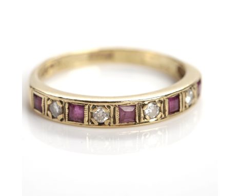 RUBY AND DIAMOND RING
set with alternating rubies and diamonds, in nine carat gold, size S-T