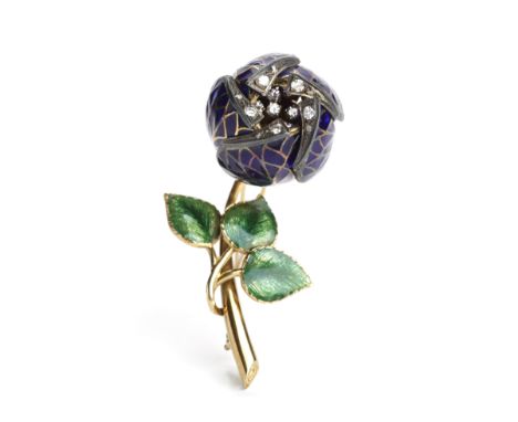 UNUSUAL DIAMOND AND ENAMEL ARTICULATED FLOWER BROOCH
the articulated bud opening to reveal brilliant cut diamonds, with furth