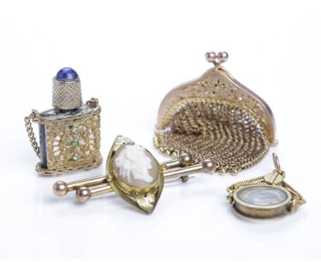 NINE CARAT GOLD MINIATURE MESH PURSE
marked 9ct, 19.3g, along with a cameo bar brooch, miniature scent bottle and miniature c