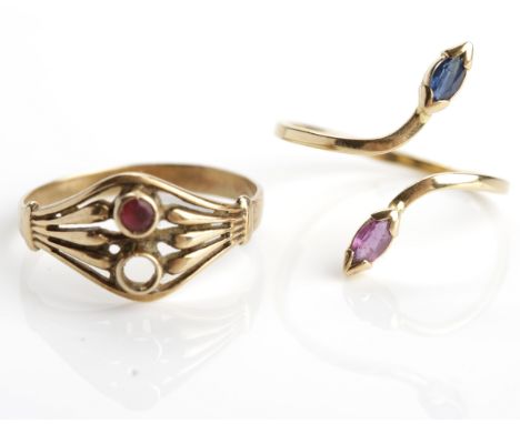 RUBY AND SAPPHIRE SERPENT MOTIF RING
with two heads, each set with a gem stone, unmarked; along with a ruby set ring, missing