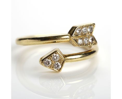 EIGHTEEN CARAT GOLD ARROW MOTIF DIAMOND RING
set with nine brilliant cut diamonds, hallmarked for eighteen carat gold, size M