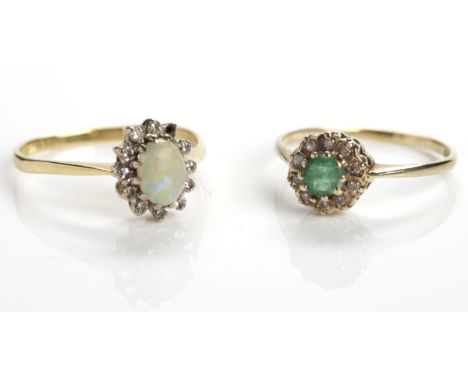 EMERALD AND DIAMOND CLUSTER RING
in nine carat gold, size O; along with an opal and diamond cluster ring, in eighteen carat g