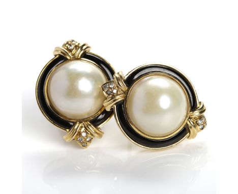 PAIR OF PEARL AND DIAMOND EARRINGS
each with a hemispherical pearl surrounded by black enamel and with two clusters of diamon