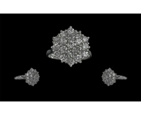 18ct White Gold Attractive and Quality Diamond Set Dress Ring, Flower head Design. Marked 18ct to Interior of Shank. The Roun