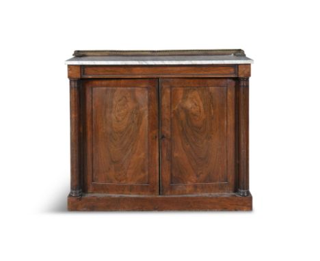 A WILLIAM IV FIGURED ROSEWOOD SIDE CABINET, C.1830, the white marble top with three quarter mahogany and brass gallery, the b