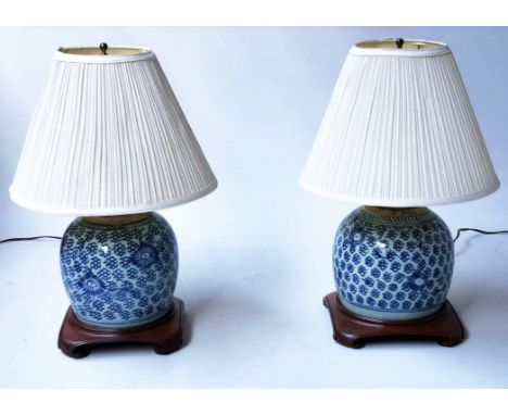 LAMPS, two, Chinese ceramic blue and white ginger jar form with wooden bases, 52cm H. (2)
