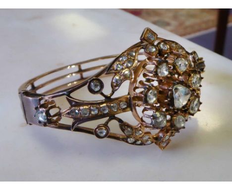 19TH CENTURY MIDDLE EASTERN HINGED BANGLE, set with old cut diamonds, unmarked, gross item weight 38g.