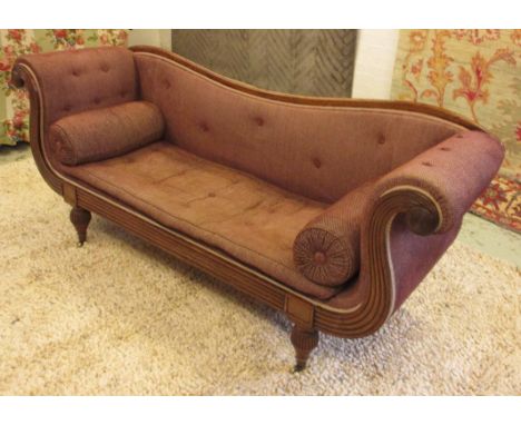SOFA, Regency mahogany framed with scrolled sides and two bolster cushions on short reeded turned front supports with capping