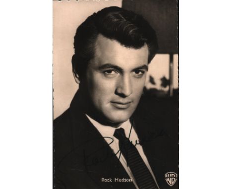 Rock Hudson signed vintage 6x4 inch black and white photo postcard. Good condition. All autographs come with a Certificate of