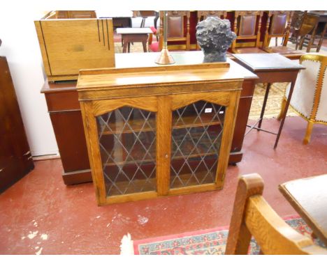 Oak and leaded light cabinet