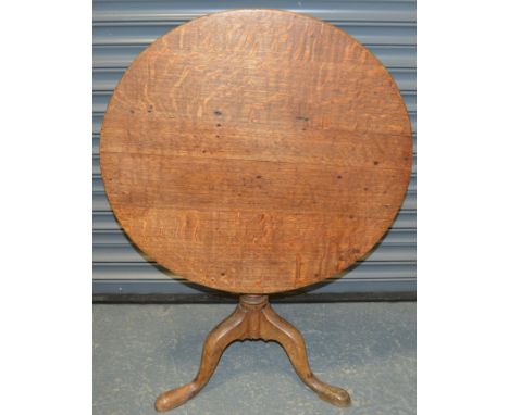 Oak tilt top pedestal table 29' diam.  30-50