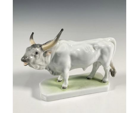 Hand-painted glazed porcelain ox figurine elegantly crafted in white and grey, resting on a simple base. Herend Hungary backs