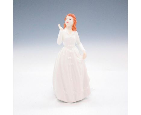 Dressed in white with light brown hair. Part of the International Collector's Club. Royal Doulton backstamp. This item has it