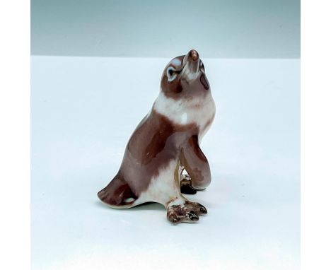 Adorable figurine of in penguin grey, brown, and white coloration. DJ Copenhagen backstamp. Issued: 20th CenturyDimensions: 2