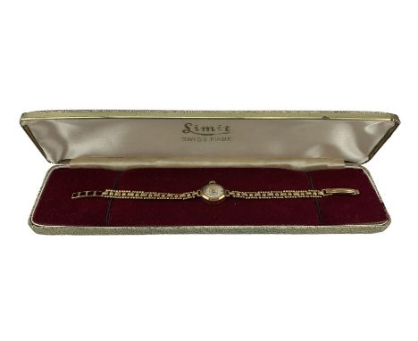 Limit ladies 9ct gold manual wind wristwatch, on fancy 9ct gold bracelet, both hallmarked, L18.5cmCondition Report:Approx 8.1