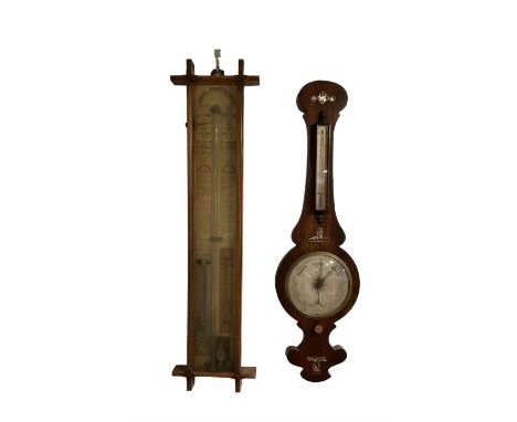 19th century Admiral Fitzroy barometer and a late 19th century two glass wheel barometer.Fitzroy barometer with original pape
