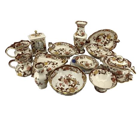 Mason's Brown Velvet pottery to include a mantle clock, pair of graduated jugs, bowls, various sized serving dishes, sauce tu