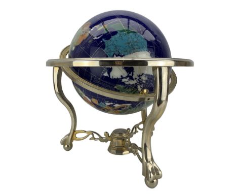 Table top terrestrial globe inset with semi-precious stones on a blue ground in metal frame with compass, H50cm