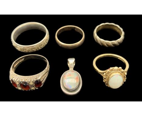 9ct gold and silver jewellery, comprising 9ct gold opal ring, 9ct gold band ring, silver Celtic design ring, silver wavy band