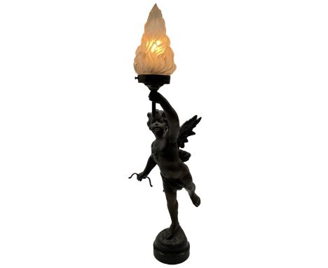 Late Victorian spelter figural lamp in the form of a winged cherub with glass shade, adapted to electric H54cm