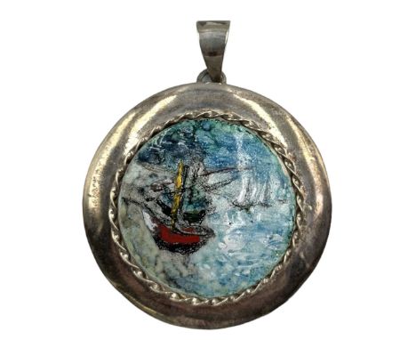 Modern silver pendant, of circular form with central enamel plaque depicting a coastal scene, within a rope twist border, hal