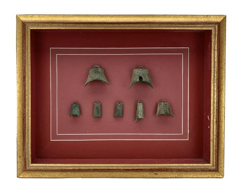 Eight Chinese Archaic bronze bells, mounted onto board in gilt frame, 40cm x 51cm