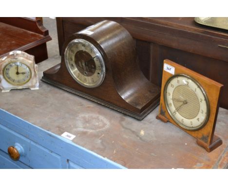 An early 20th century oak mantel clock; others (3)