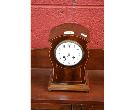 An Edwardian mahogany mantel clock, inlaid with boxwood stringing C1910   Condition Report:  some scuffs, knocks and bruises 