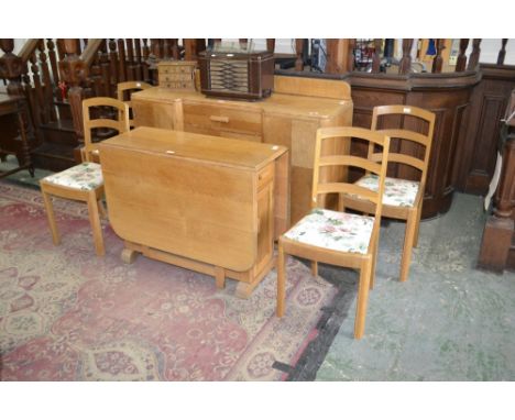 An oak and beech Art Deco style six piece dining room suite comprising dropleaf, four bar back dining chairs and sideboard, c