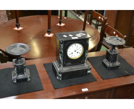 A Belge Noir clock garniture, Girault clok, tazza stands. (3)