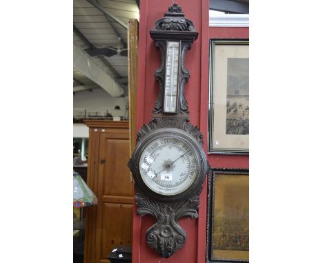 A late Victorian mahogany aneroid wheel barometer, with thermometer, c.1880