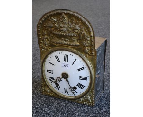 A Comptoise wall clock.