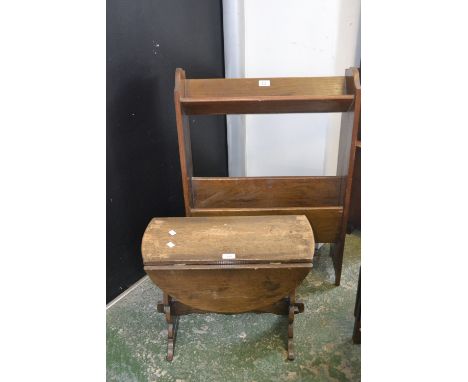 An oak dropleaf occasional table; an oak book trough canterbury. (2)