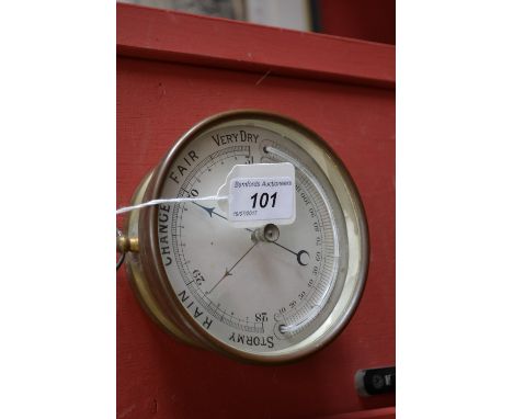 A Victorian brass cased barometer and thermometer