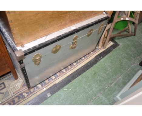 A large travel trunk