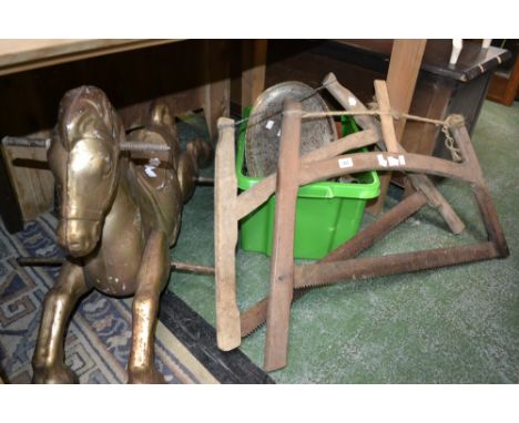 A vintage rocking horse; a pair of French vintage rustic buck saws; French drinking bottle EPNS ware; a cased clock; etc 