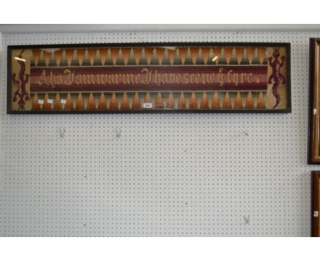 A tapestry wall hanging (All Ye Damn Men Shall See Me In Fire), with fierce dragon motifs, in colourful wools, 120cm x 28cm, 