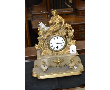 A 19th century French gilt and marble clock, on platform base