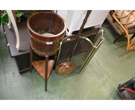 A coopered oak floor standing planter; a copper warming pan a brass folding fire screen