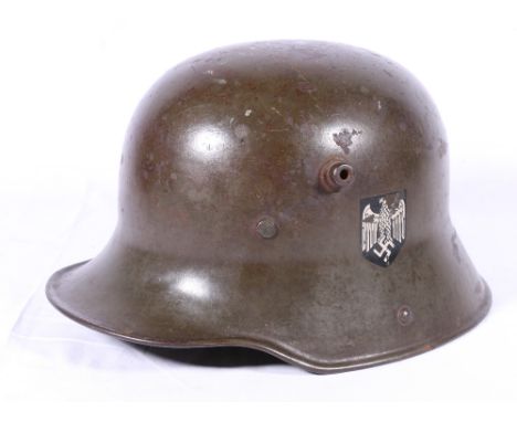 German model 1917 Stahlhelm steel helmet with double decal Wehrmachtadler and National shield, partial liner