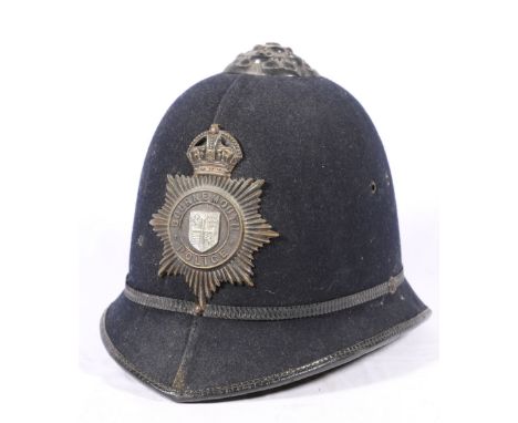 20th century blue cloth police helmet with Bournemouth Police badge.