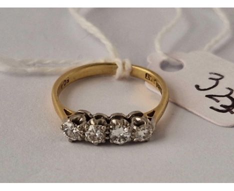 A FOUR STONE DIAMOND RING, 18ct, size K, 2.3 g.