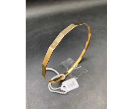 A SLAVE BANGLE, 9ct, 13.2 g.