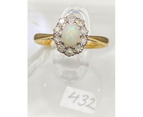 A antique opal and diamond cluster ring 18ct gold size J 2.3 gms