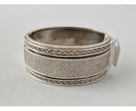 A wide silver bangle 50 gms