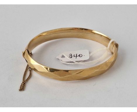 A rolled gold bangle