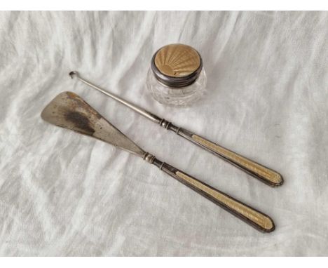 A circular enamel top jar and a matching button hook and shoe horn, Birmingham 1930