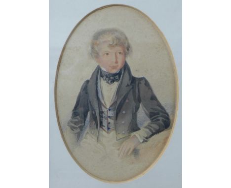 English School (19th Century), oval half length portrait of a boy, watercolour, 15 x 10cms, mahogany frame